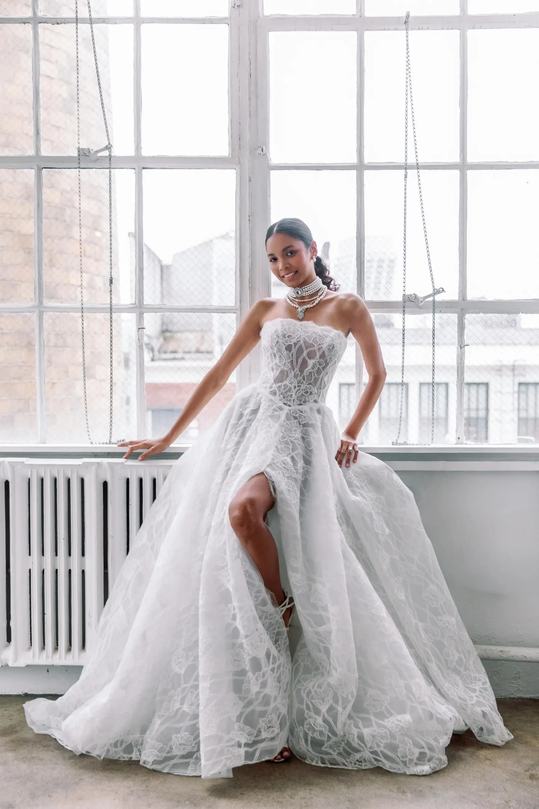 Model wearing a designer dress