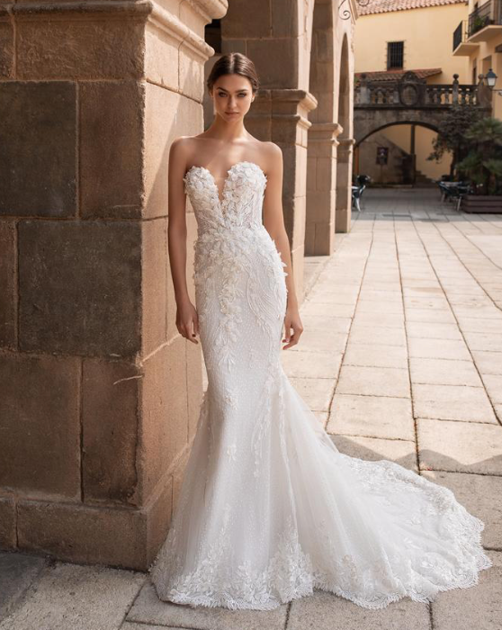 Model wearing a designer dress