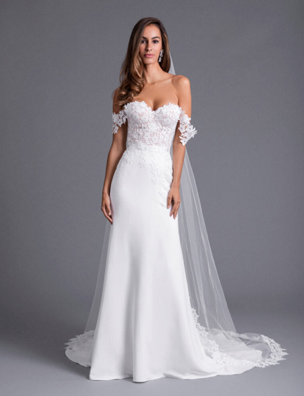 Model wearing a designer dress