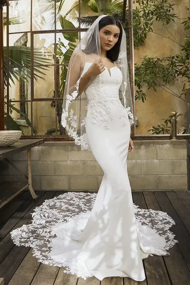 Model wearing a designer dress