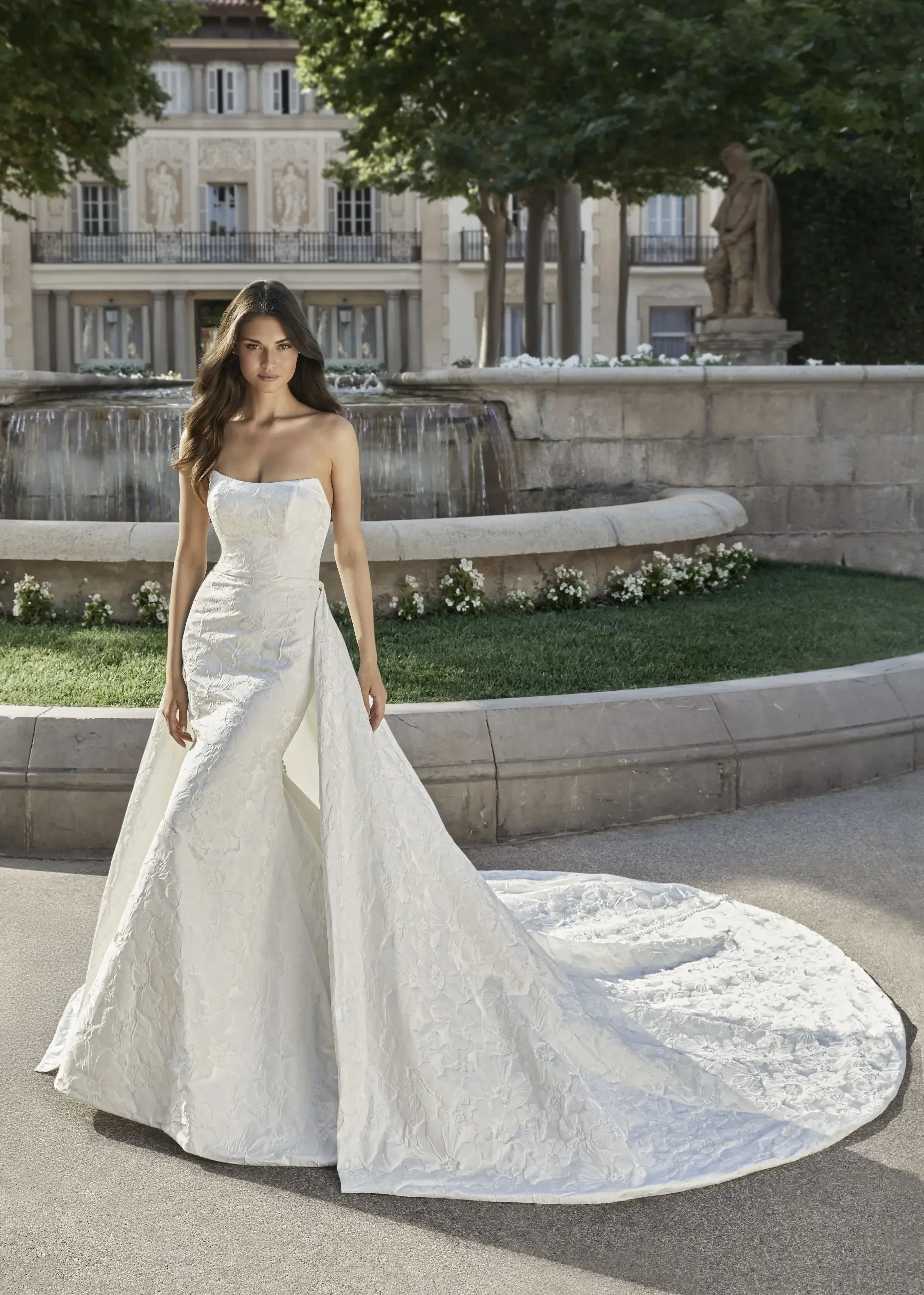 Model wearing a designer dress