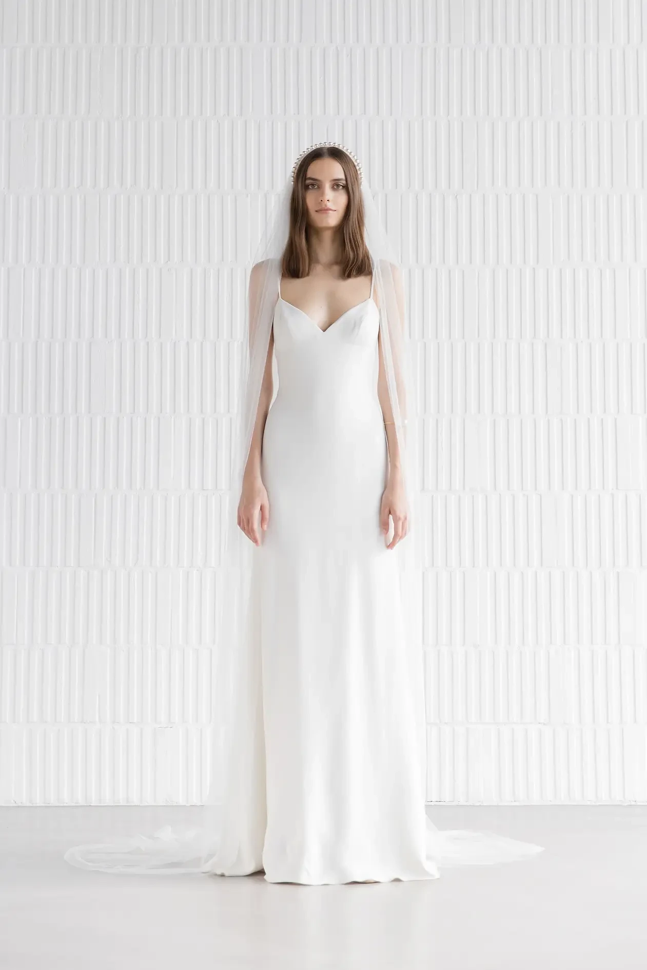 Model wearing a designer dress
