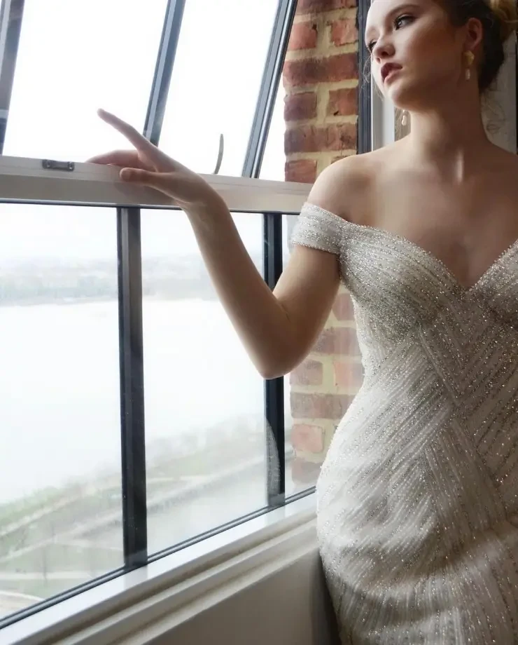 Model wearing a designer dress