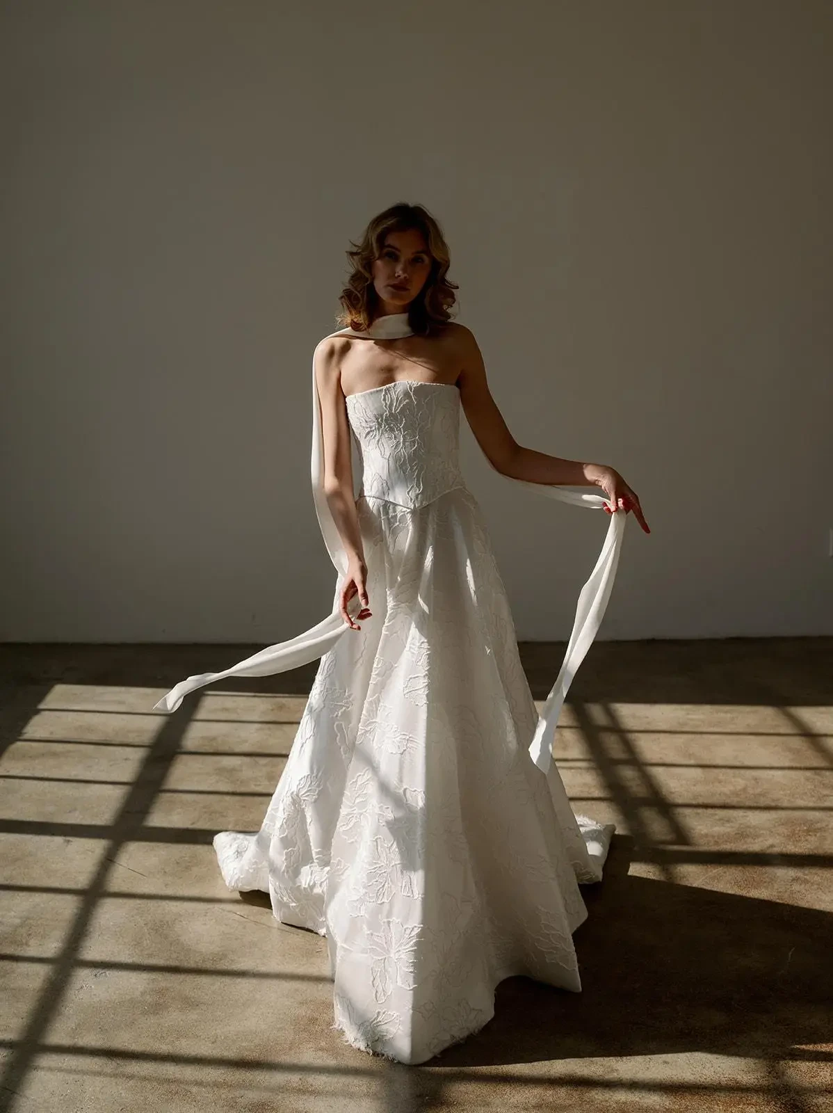 Model wearing a designer dress