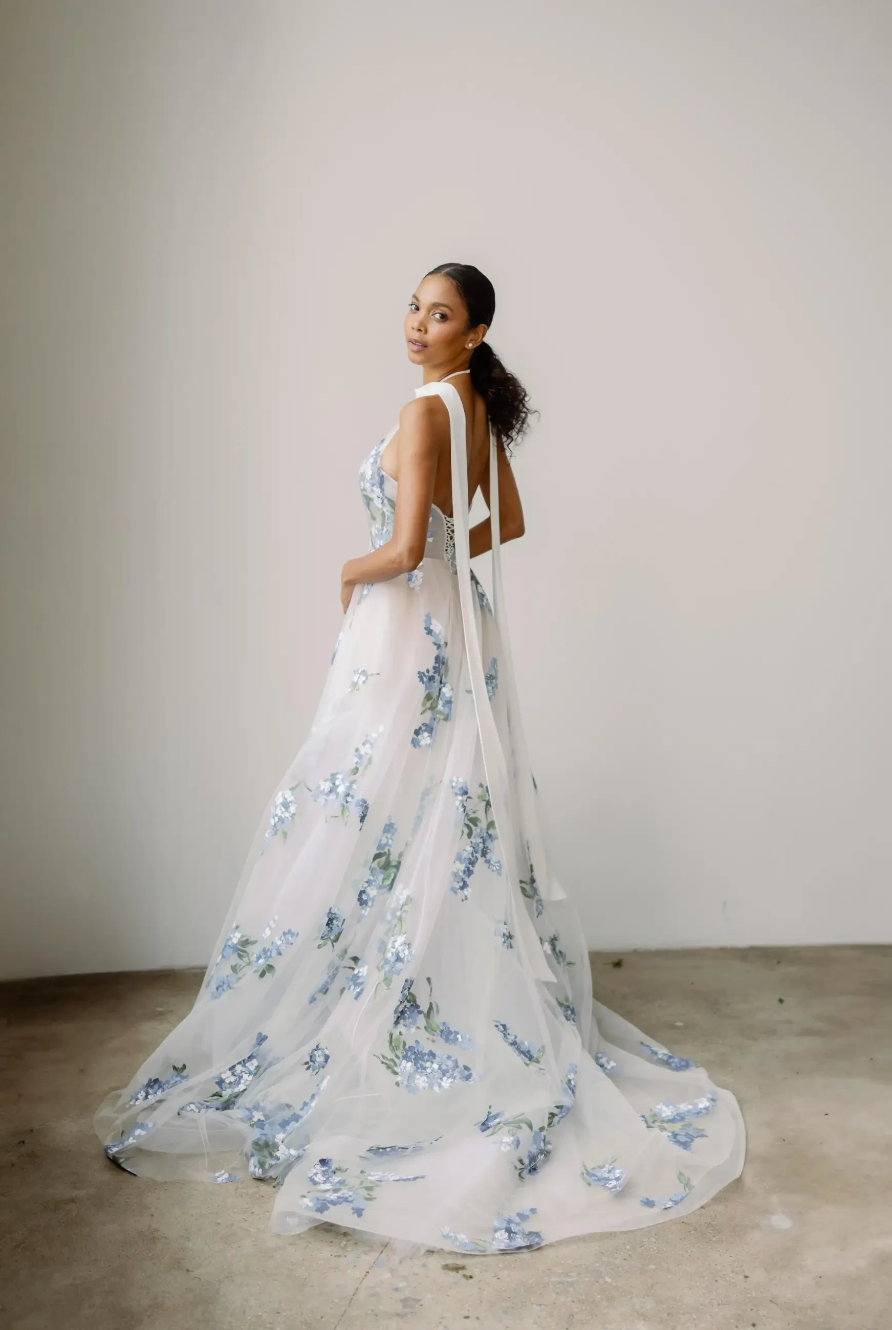 Model wearing a designer dress