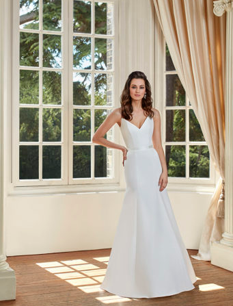 Model wearing a designer dress