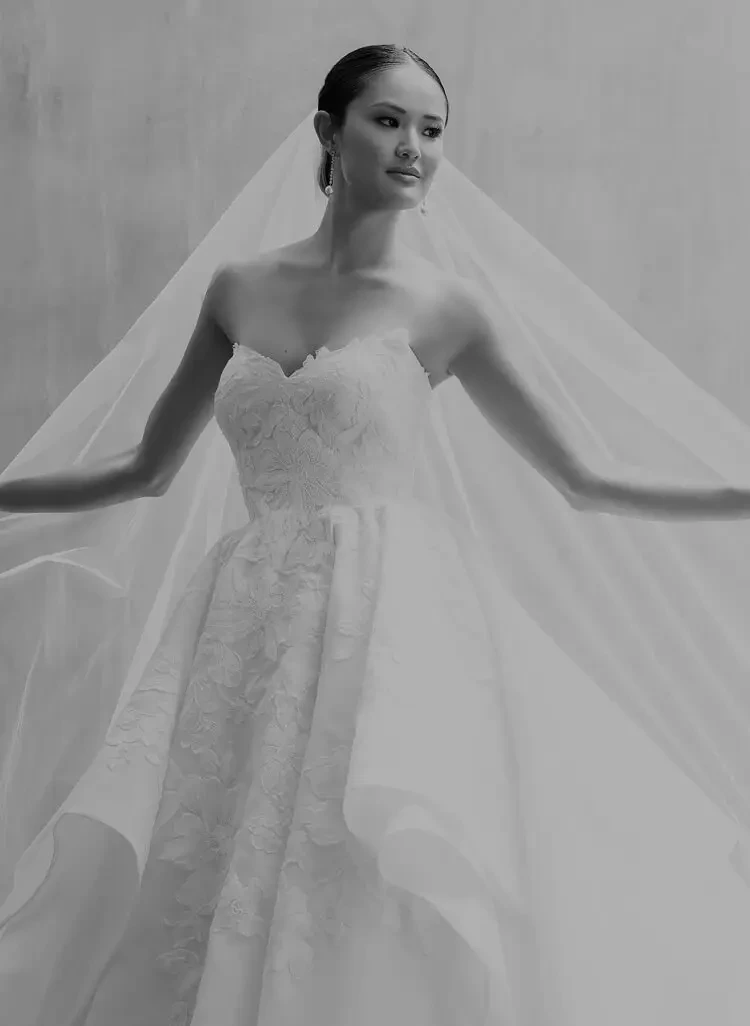 Model wearing a white bridal gown