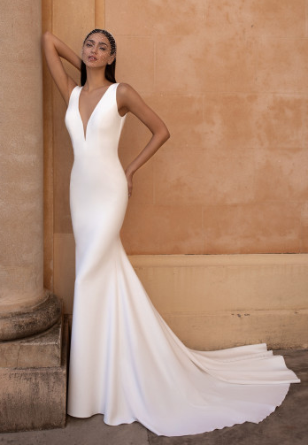 Model wearing a designer dress