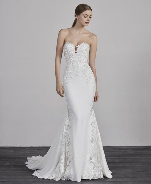 Model wearing a designer dress