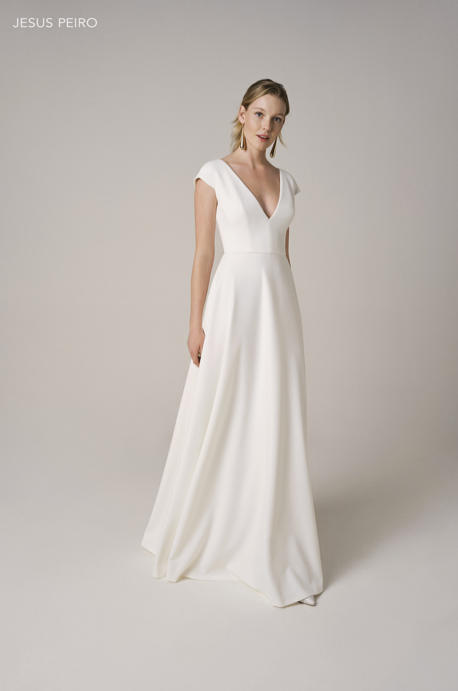 Model wearing a designer dress